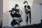 Banksy's paintings are thought provoking and often carry complex social issues in simple to understand images
