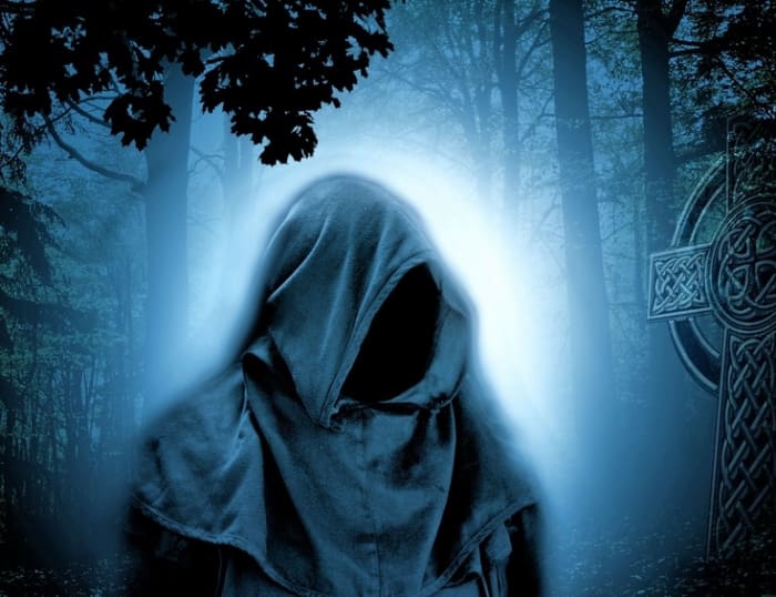 A depiction of a dark sorcerer. A black arts magician is no different than other kinds, visually speaking; however, there is a group mentality, and dark sorcerers tend to appreciate all things dark, such as this image