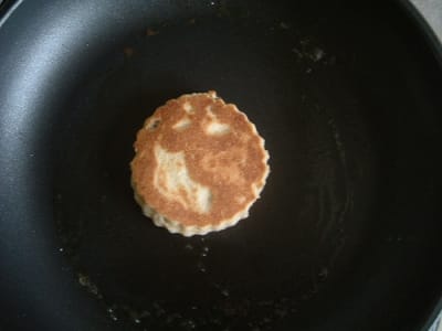 Cook the Welsh Cakes on a lightly greased bakestone or heavy based frying pan (skillet) until they are golden brown on each side