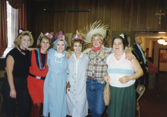Elizabeth in cat costume, Marsha as punker, me in scrubs, Cathy as domestic goddess and Mike as scarecrow.