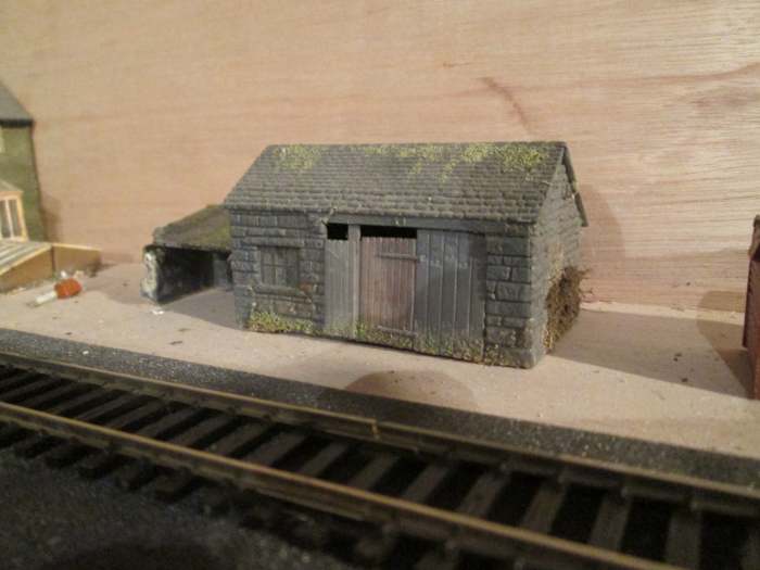 The modified Wills' forge kit with lean-to shed (left) from their 'grotty huts and privy' kit... These structures will be used on the 'Ainthorpe Junction' layout in my cellar