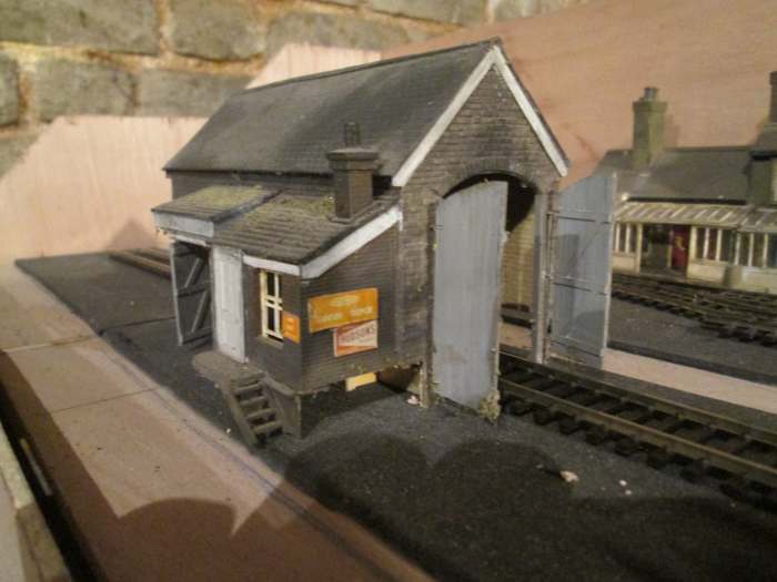 The goods shed from the same layout, using the same detailing sources, split pins and brass wire for door 'hinges', Ratio chimney. The door was made up using strip planking.
