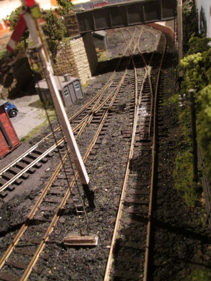 North Eastern slotted post signal kits are from Wizard Models. Intricate assembly but worth the effort when they work! This 'home' stands close to the semi-distant.. A starter is needed for platform end, and Ratio ground signals to complete