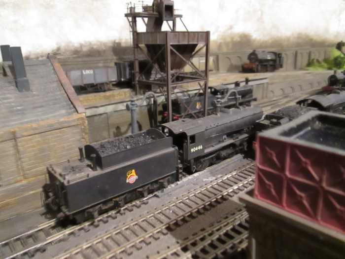 Ayton Lane's coaling tower kit needed modifications to fit in its location. Right foreground: Hornby 'Skaledale' water tower based on Goathland; left is entry to scratch-built two-road loco shed, Mike's Models water cranes; track now cinder-ballasted