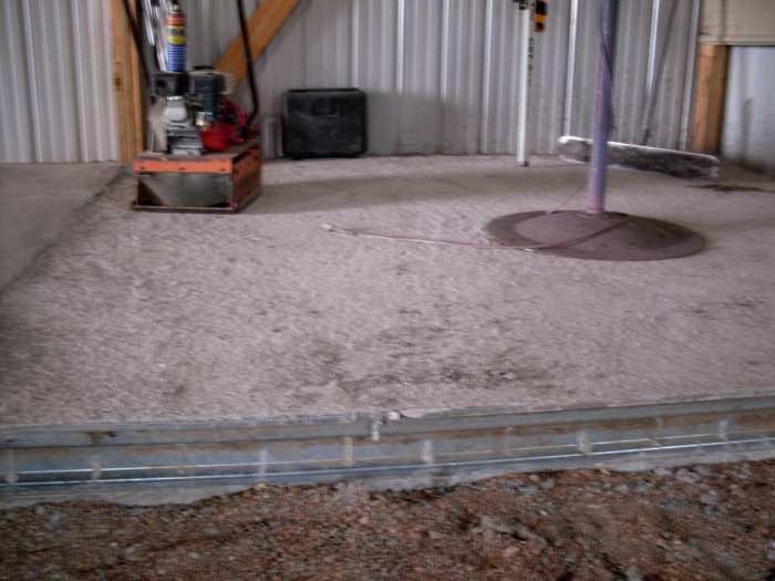 This machine helps compact and settle the dirt, so air pockets don't cause problems during or after the pouring of the concrete.