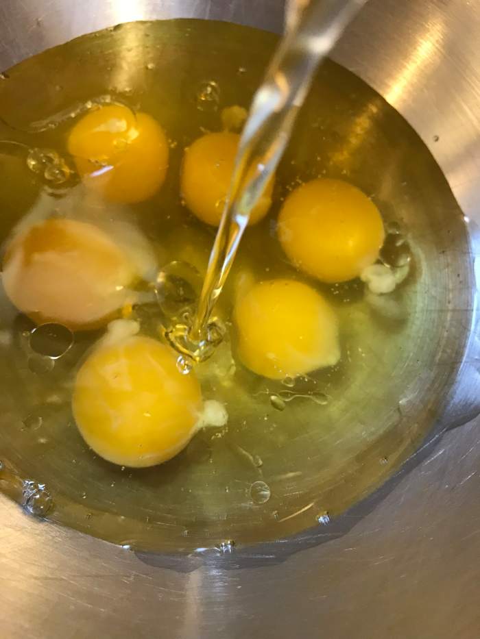Mix together the eggs, pumpkin, oil and sugar in the bowl of an electric mixer, and beat until smooth. Pick a big bowl - you'll need the room!