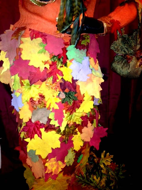 Her leaf dress was designed by me. I made most all the leaves using my primitive folk art design. Each hand stitched in place.