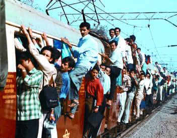 People hanging with this local train in MUMBAI are not trying to attempt a Guinness world record, It is part of their daily life.