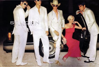 Kelly Gray with cowboys for one of St. John Knits first advertising campaigns
