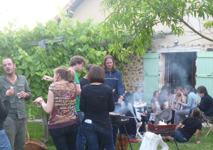 Champagne and sausages to celebrate the birthday of one of the members of the War of the Buttons film crew at our gite. (You can just see the peach trees in the foreground!)