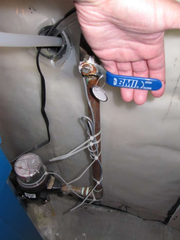 Shut off valve at the water meter. Make sure to turn this off if you don't have shut off valves under your kithcen or bathroom sink when changing your taps