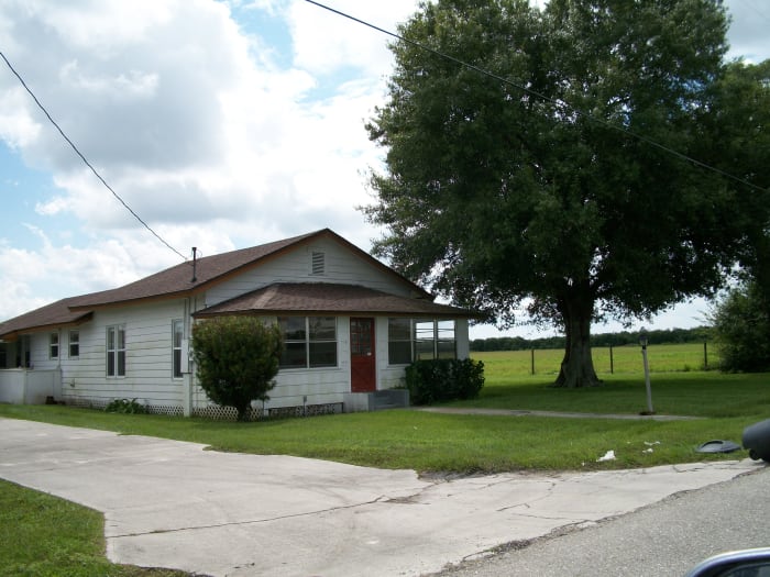 Hattie May's place. The current owner has several black and tan hounds that set up a noisy objection to our presence and chased us down the road, in full voice.