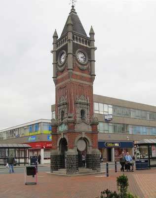 The King Edward VII Memorial clocktower stands at one end of the High Street...