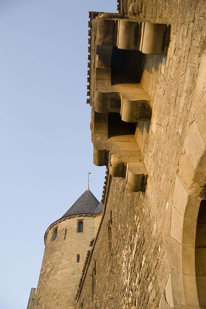 These holes above the gate of this medieval castle are toilets right above the gate. I might have to find another gate.