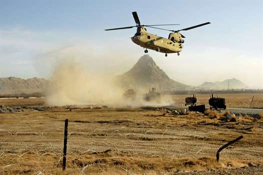 U.S. Army CH-47 Chinook helicopter offloading soldiers near the Arghandab district in Afghanistan's Kandahar province, Jan. 31, 2011.