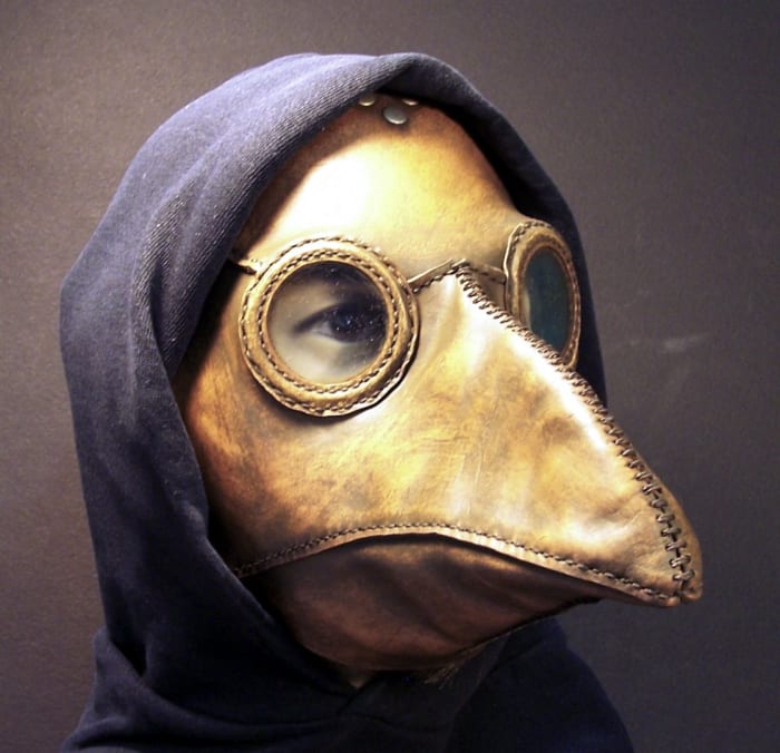 Leather "plague doctor" face mask. The "beak was stuffed with aromatic herbs and essential oils to protect the doctor.but must have been terrifying for the patient.