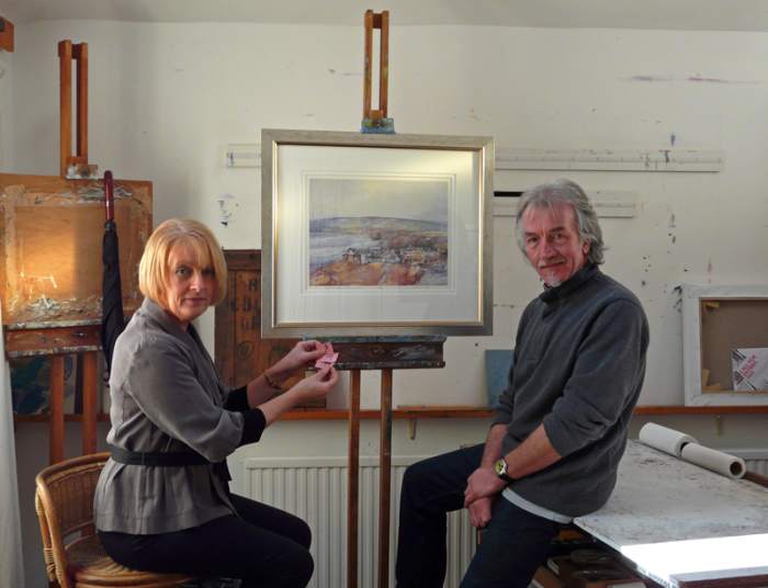 The artist Tom Harland, creator of the 4mm scale 'Bramblewick' layout is seen here with Julie Abrahams,