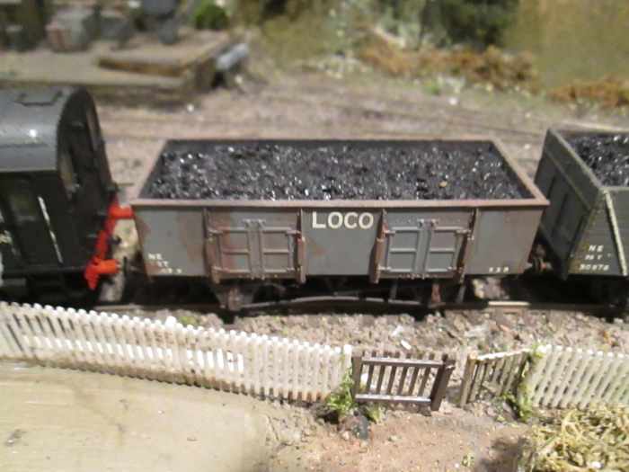 Steel-built LNER 'cupboard door'' loco coal wagon complete with painted 'rust', bent tension bar, muck and load