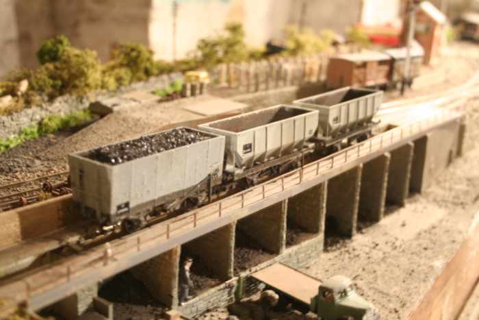 A pair of ex-LNER 21t steel hoppers (modified Dapol) and one ex-NER/LNER 20t wood-built hopper, all in early BR livery at Thoraldby's coal depot. Typical BR North Eastern Region scene carried over into the post-war era. Eight cells for four wagons