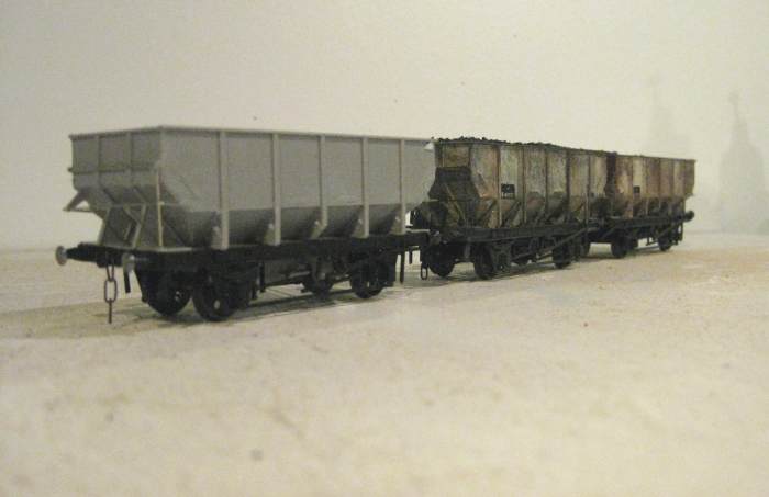 Trio of Parkside BR Dgm 1/146 Steel hoppers (Kit PC77) based on LNER Dgm 100, of which there were variants. Nearest vehicle is as assembled before numbering, behind are numbered and weathered wagons as would have been seen anywhere on the system