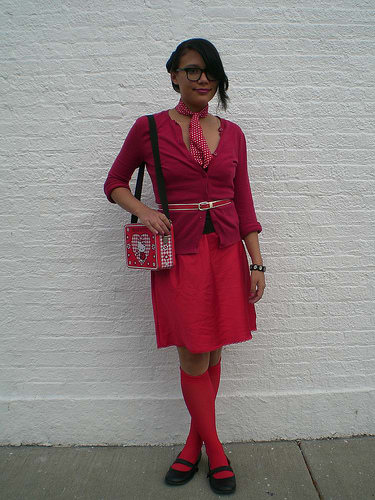 Accessories: Lunch box bag, knee-high socks, Mary Jane shoes, skinny belt, patterned scarf, black bangle, and thick-framed