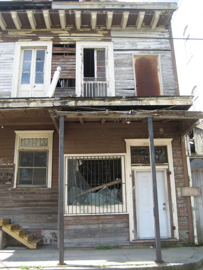 An abandoned building, a telltale sign of a dangerous neighborhood.