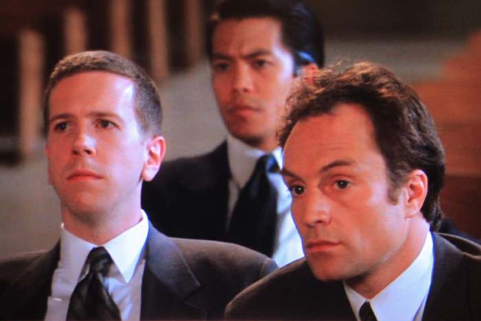 Robert Stanton plays the consular official and Bradley Whitford plays Jack's associate. Byron Mann as Lin Dan is seated in the background