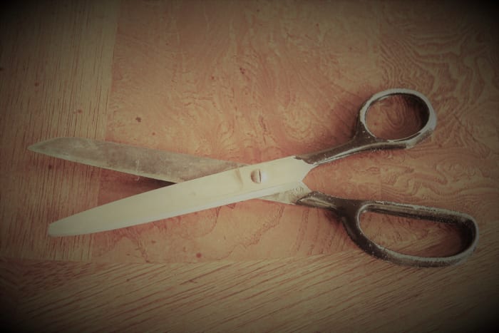 Be careful when trimming your own hair, and if possible, go to a beauty shop that you trust so that your hair will grow out the way you want it too.