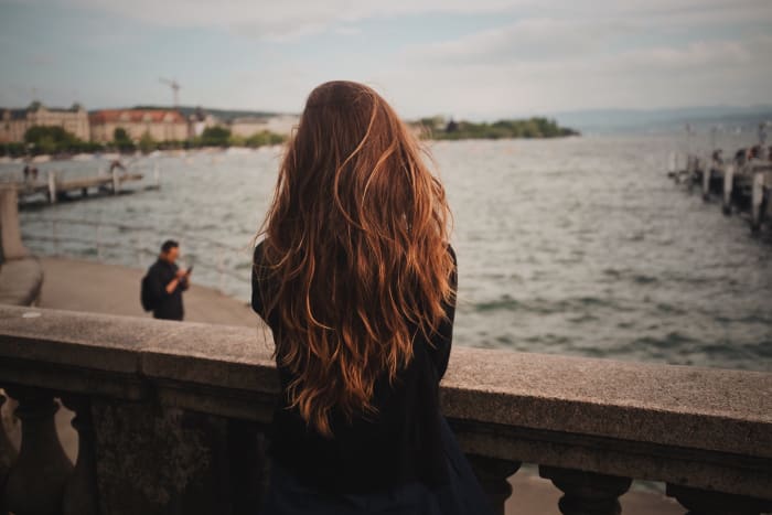 One of the best ways to grow your hair out is to just let it grow naturally and to not pull it back too tight or too often!