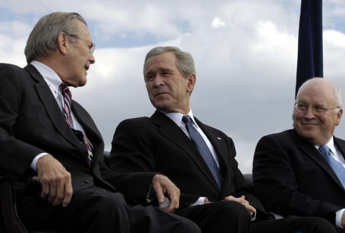 L to R: Secretary of Defense Donald Rumsfeld, President George W. Bush, and Vice President Dick Cheney