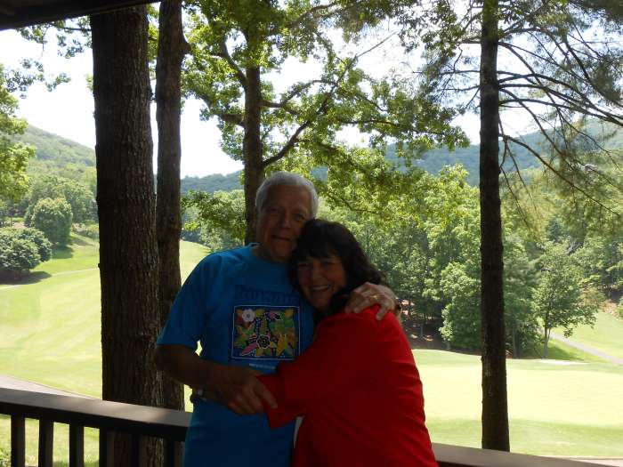 Here I am with my husband in May, 2013. I wear 2 shirts sometimes to cover up what I don't want seen. I actually think that sometimes that makes me look larger than I am.