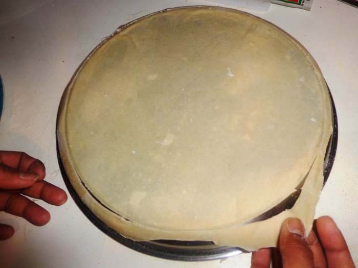 Remove the plate and you can see the excess dough from the marked piece. Take those excess one out as shown in the picture.