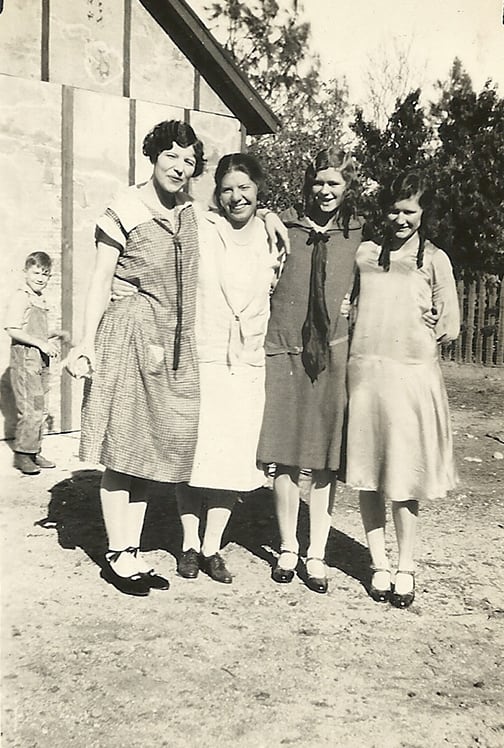 My grandmother (right), her sister Lois next to her and two family friends, Thanksgiving 1927. Even then they had photo bombers.