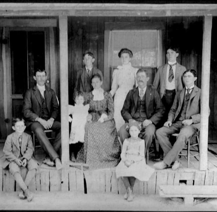 Photo Reference: Benjamin & Francis Bollinger Family, circa 1902. Middle row far left is Joshua Franklin Bollinger who married Amy Georgiana Boyd.