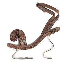 A couple of rolled up towels placed in the heel could make it a practical and useful beach promenade or swimming poolside shoe.