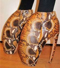 The only things ruining the look of the Snakeskin Wedge are zips and hems. As these are not naturally found on real snakes in the wild, it might be an idea to remove them.