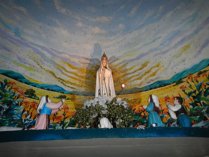 Statues depicting the Blessed Virgin Mary appearing to the three children of Fatima. These images are at the National Shrine of Our Lady of Fatima located in Marulas, Valenzuela City, Philippines.