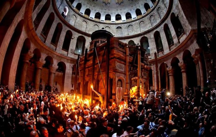 Holy fire is a ceremony in sepulcher church taking place on Holy Saturday, the day after Good Friday. Notice the Aedicule located inside the Rotunda right under the larger dome of Holy Sepulcher church.