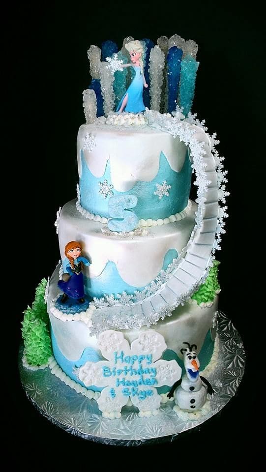 A Frozen themed birthday cake showcasing Elsa's power