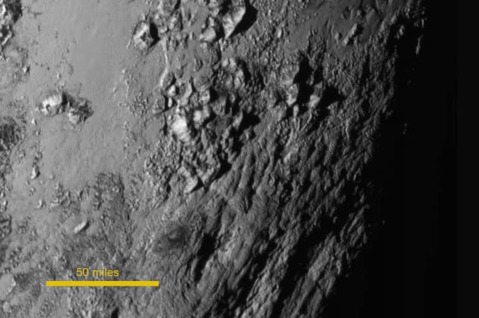 Norgay Mountains, the zoom above. Named after Sherpa who helped Hillary climb Everest. (The "heart" has been formally named Tombaugh Regio, after Pluto's discoverer.)