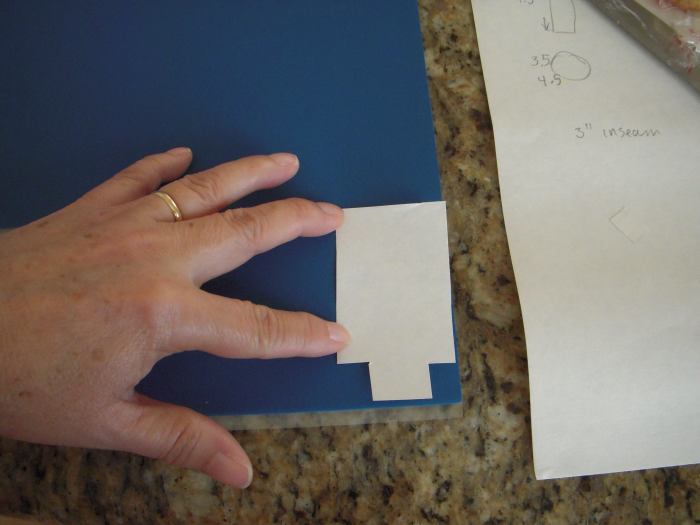 Place pattern pieces onto Sugar Sheets and cut out with scissors. You will cut pants and suspenders out of blue Sugar Sheet, and headband out of black Sugar Sheet.