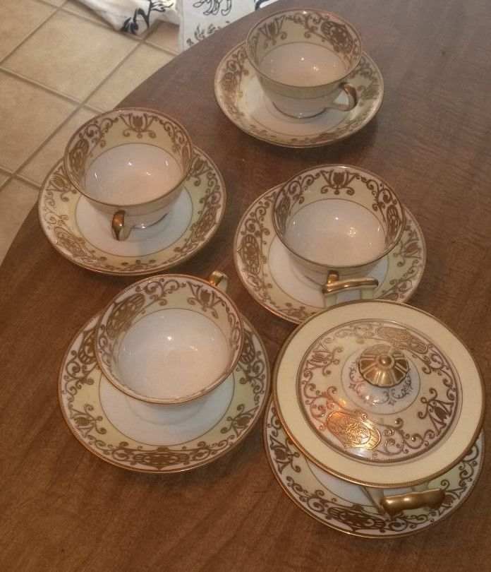 A gorgeous set of demitasse tea cups with saucers and a sugar bowl in the Christmas Ball pattern #175. All items are stamped "made in occupied Japan”.