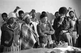 Gille de Vlieg, Pauline Moloise (mother of Ben), two women & Winnie Madikizela Mandela mourn at the Memorial Service for Benjamin Moloise, who was hanged earlier that morning. Khotso House, Johannesburg