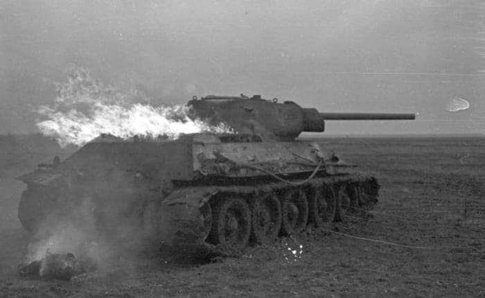 Burning Red Army T-34 Russian Front 1941, at first the Red Army had a limited number of T-34s but by the end of the war they would overwhelm the Wehrmacht.