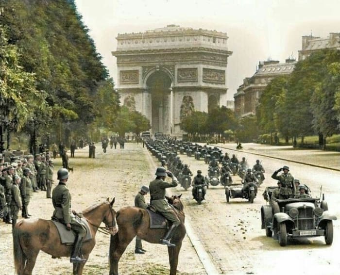 German soldiers marching through the arch de triumph in the summer of 1940 after the defeat of France.
