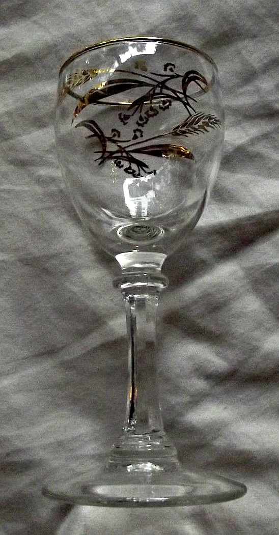 The wine goblets 5-7.8" tall in the Prairie Wheat Lifetime gold Golden accent crystal glasses stemware made by Homer Laughlin