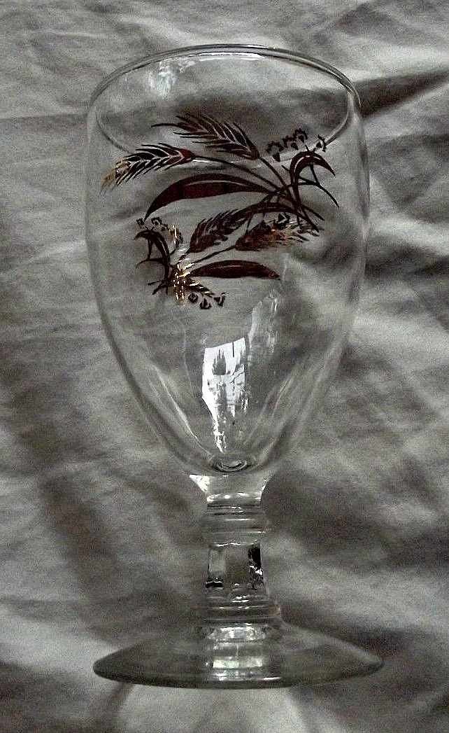 The water goblet, 5-7/8" tall in the Prairie Wheat Lifetime gold Golden accent crystal glasses stemware made by Homer Laughlin