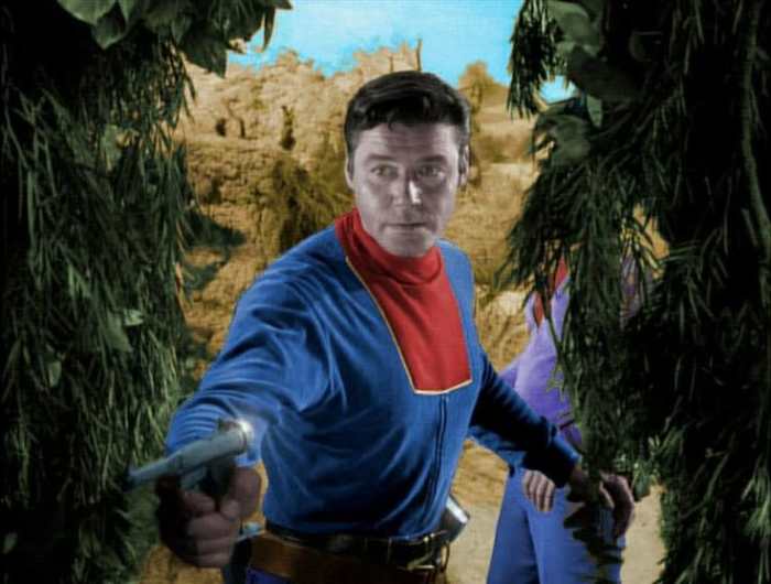 Guy Williams as Professor John Robinson doing what he does best. Defending the family from monsters and aliens