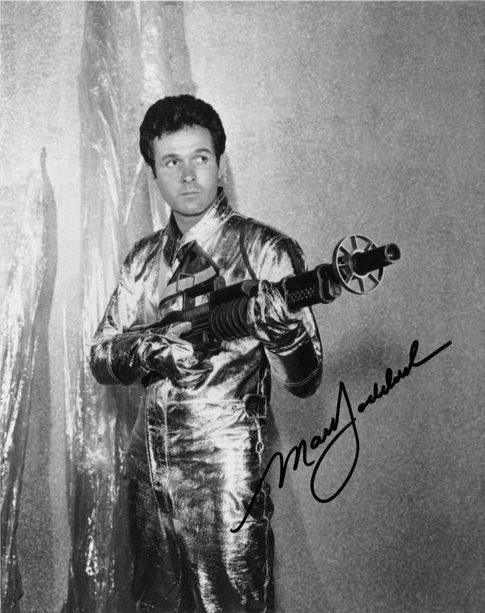 Lost in Space, Mark Goddard, Don West, with a very cool and huge Laser Rifle from the First Season. He has a look on his face like he means business.