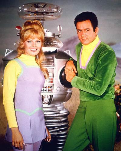 Judy Robinson played by Marta Kristen. the Robot played by Bob May and Major Don West played by Mark Goddard
